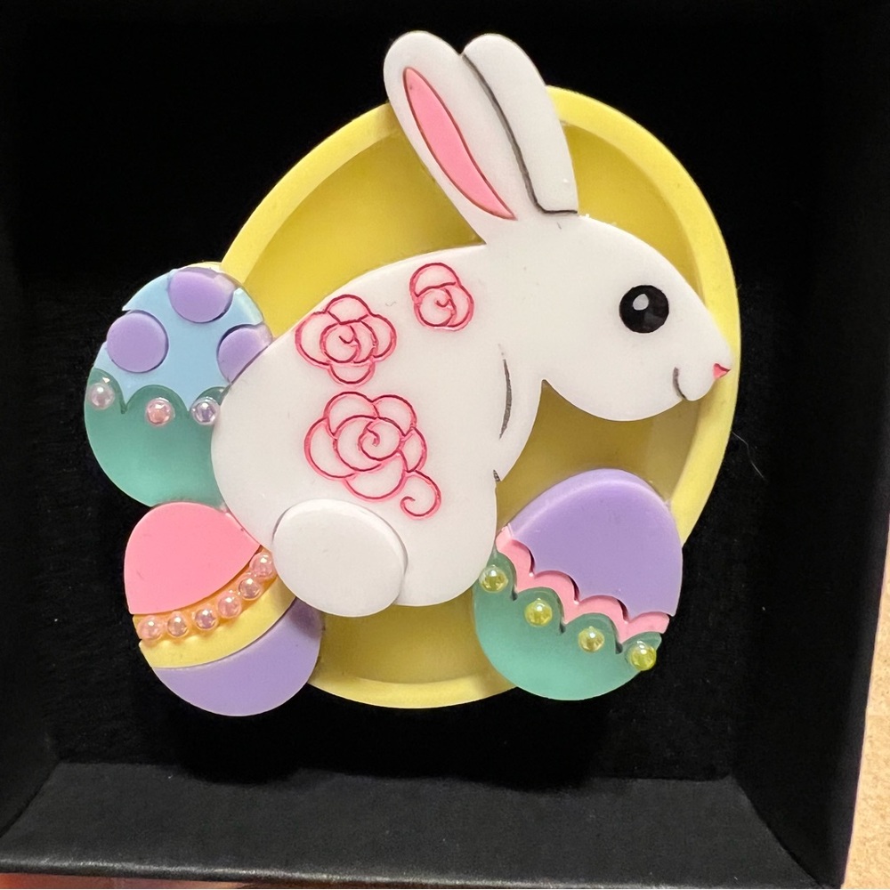 The Makings Of Miss Jones bunny with decorated eggs acrylic brooch
